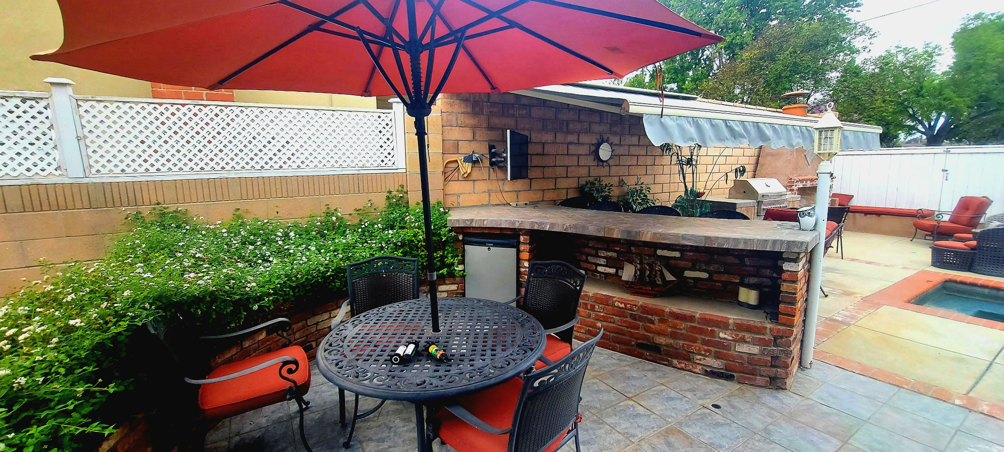 Custom outdoor brick kitchen and BBQ area